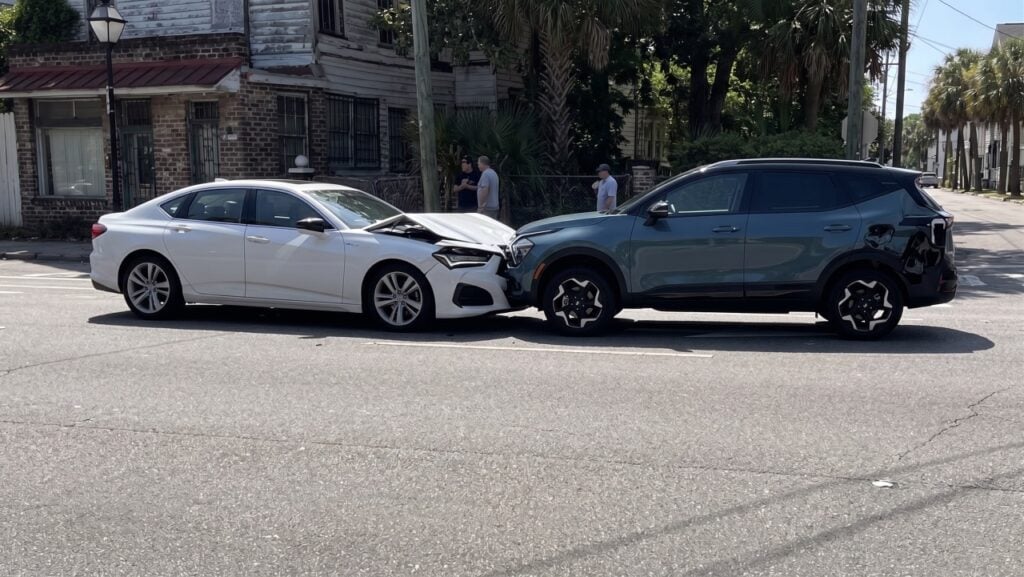Head-on collision near Courtenay Drive and the Crosstown in Charleston causing lane closure and traffic delays.
